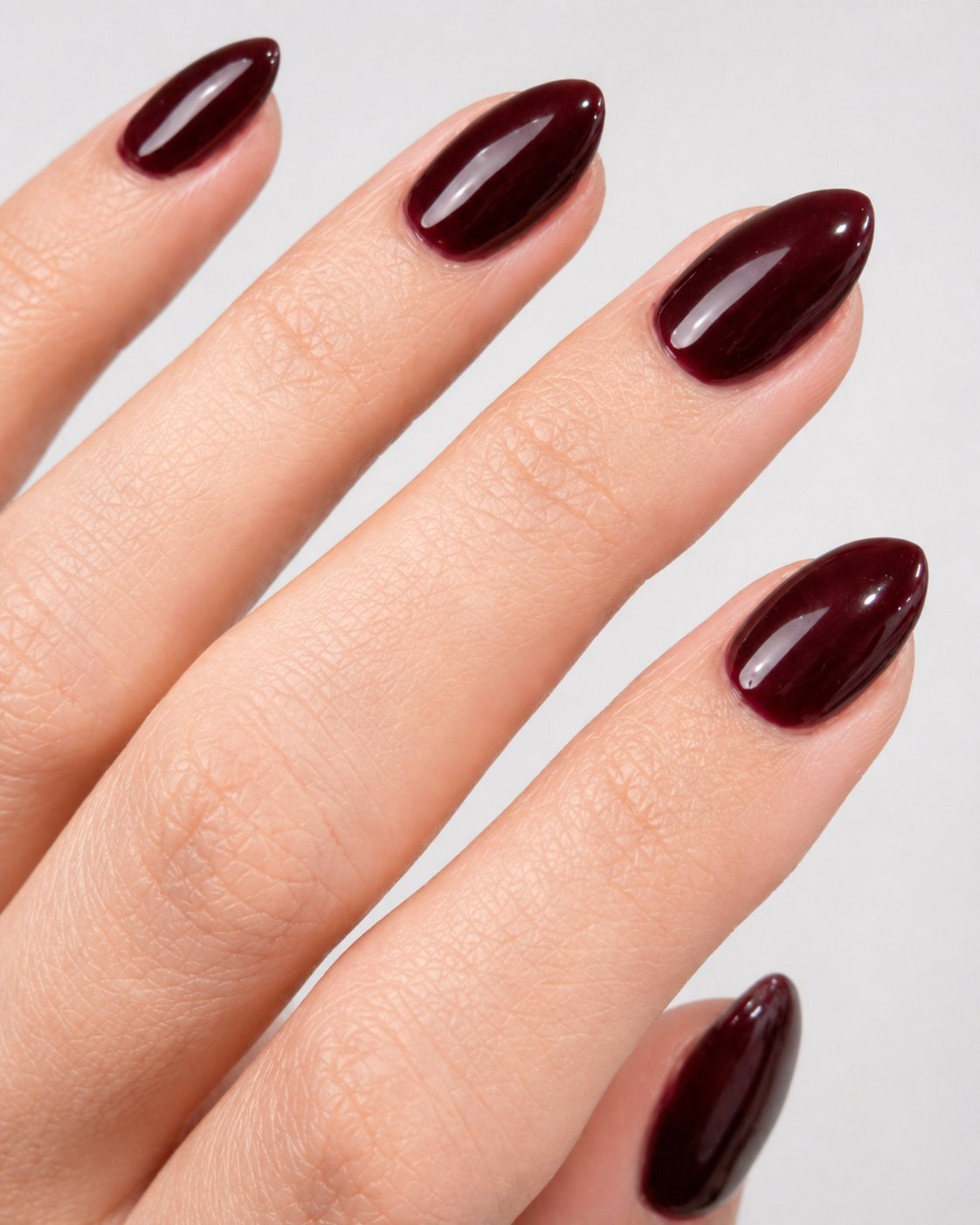 Burgundy almond gel manicure by Vannie